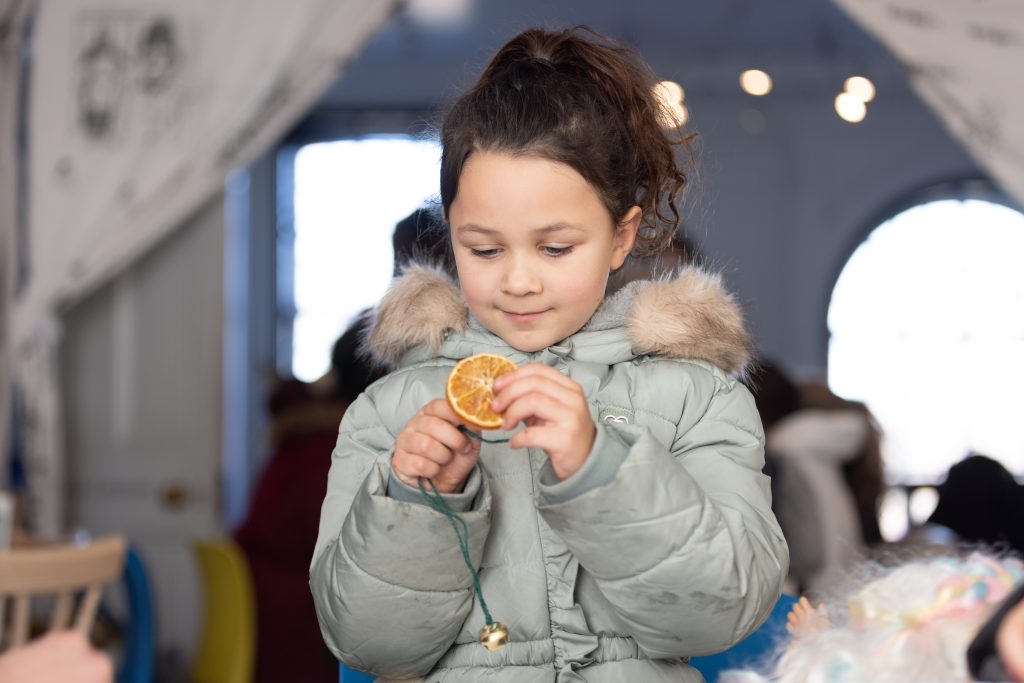 A child participating in a craft activity