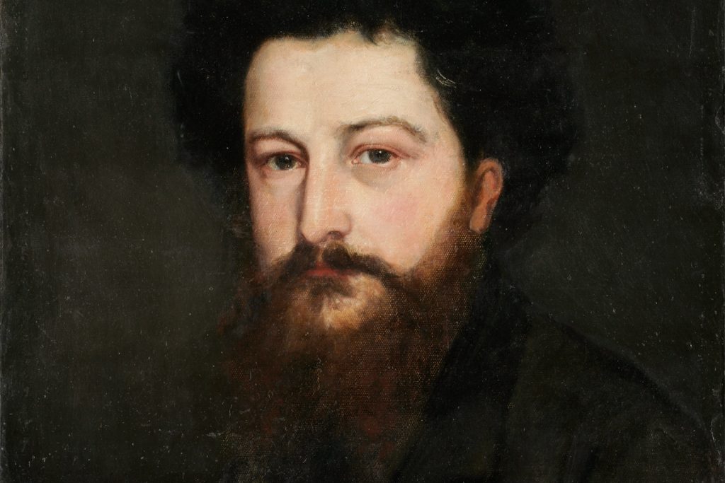 Framed oil portrait of William Morris. The portrait is hanging against a blue floral wallpaper.