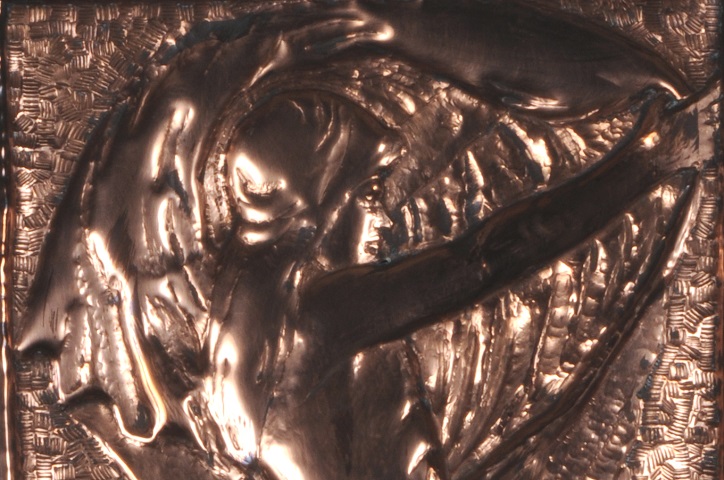 Detail of a copper repousse by Mackmurdo