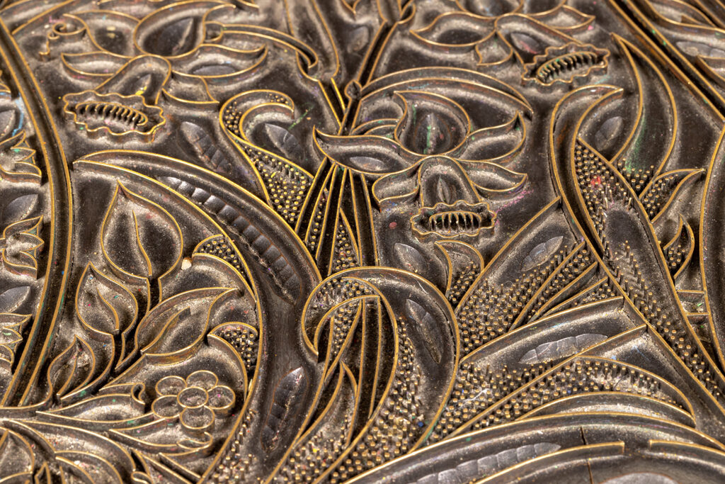 Detailed image of a wood block used in printing