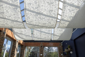Glass roof with draped fabric on the ceiling of William Morris Gallery's cafe.
