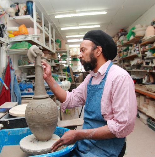 A ceramicist at work in his workshop