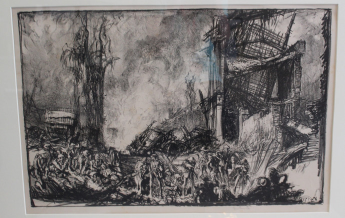 Soldiers standing and seated among debris foreground, rubble and ruined houeses background right