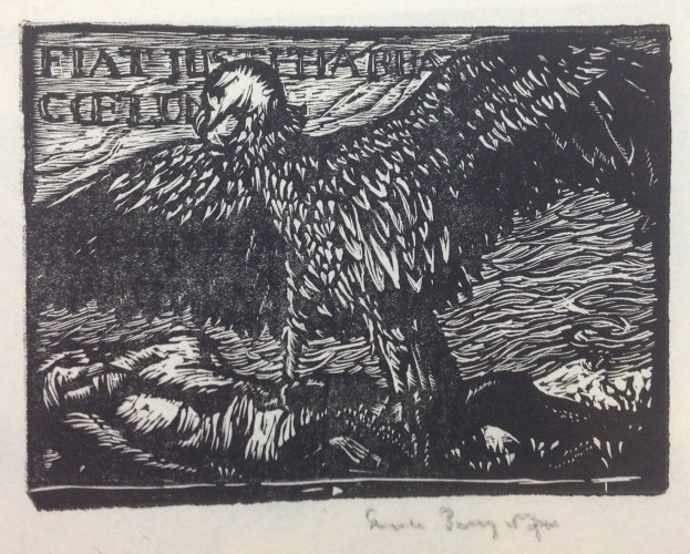 Eagle with spread wings standing on recumbent body