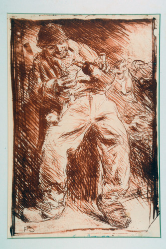 Smiling man pouring drink from bottle into a glass