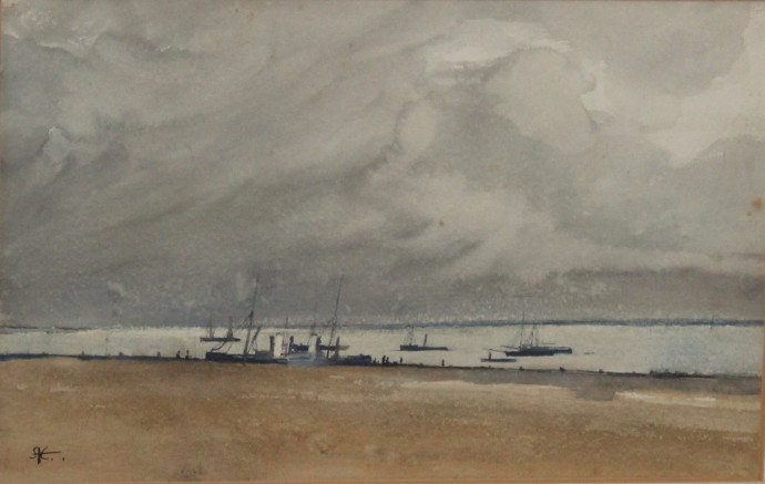 Beach with view of boats, stormy clouds over the sea