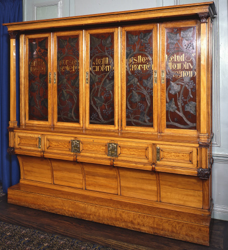 Large wooden cabinet with painted doors