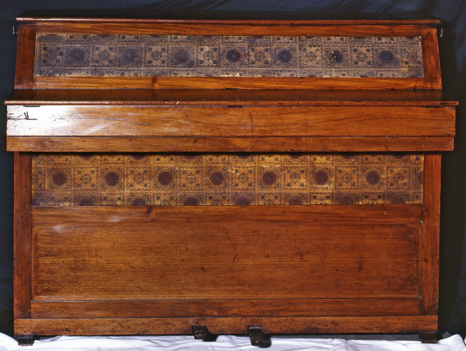 Upright piano with decorative panels