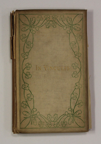 book with clover leaf decoration on cover