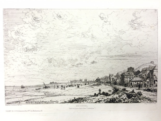 pretty beach scene with village to right