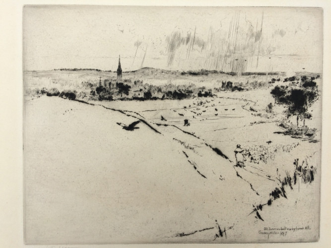 rural landscape with village in distance