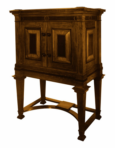A large ornate cabinet in dark wood