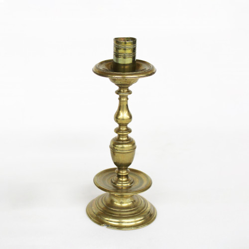 An ornate brass candlestick