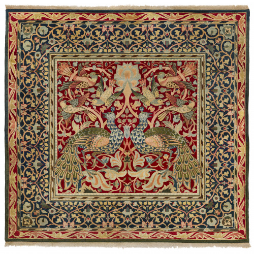 Symmetrically designed carpet with peacocks and birds