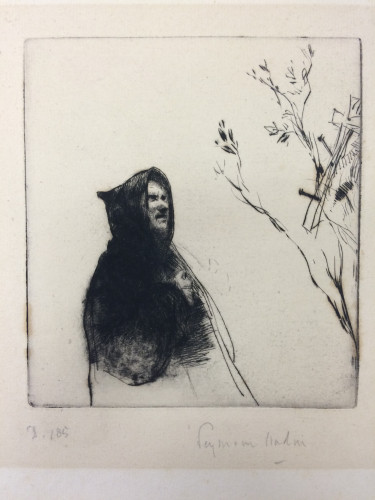 cloaked man looking up