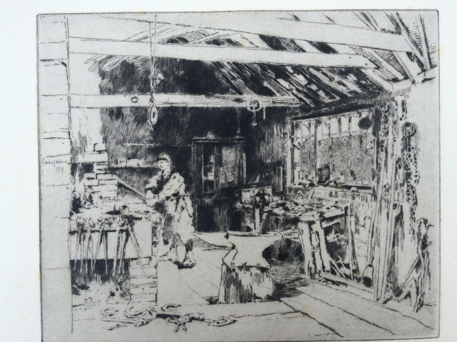 man working inside a blacksmith shop with anvil in middle room