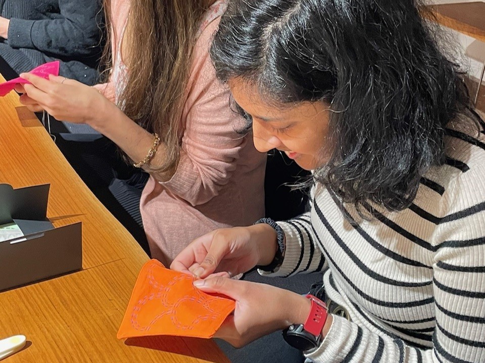 People taking part in craft workshop