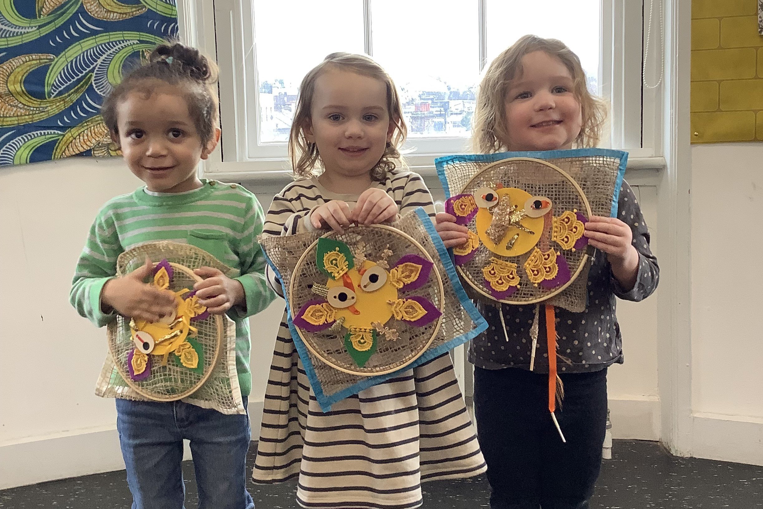 Children participating in craft sessions