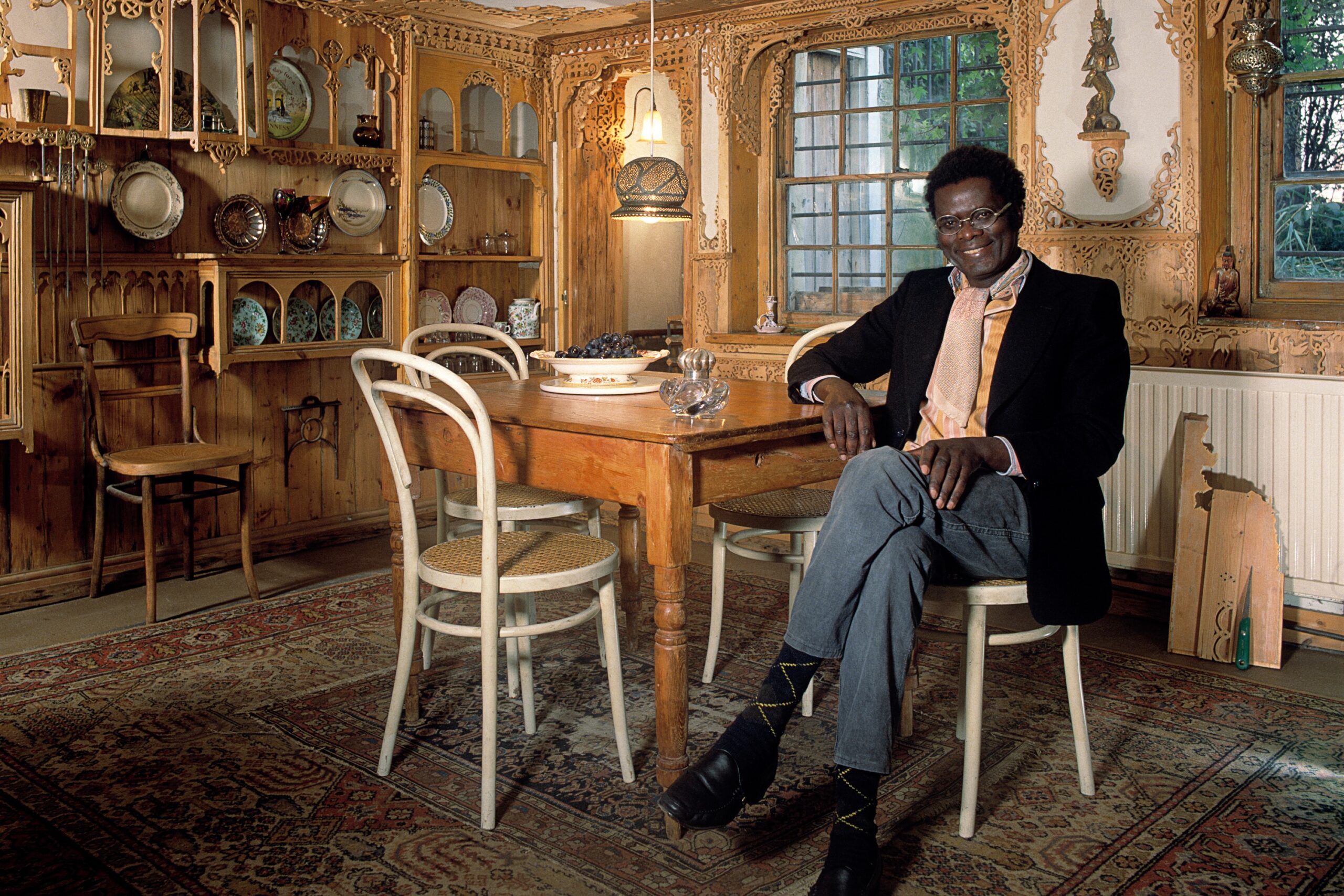 Khadambi Asalache at his home, 575 Wandsworth Road, November 1988. Gerard Mankowitz/Iconic Images