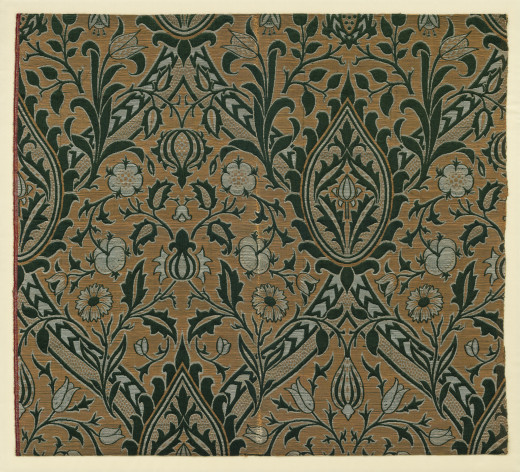 A floral woven silk textile in black and gold